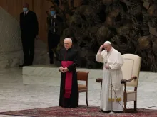 Pope Francis makes the sign of the cross during his general audience on Aug. 11, 2021.